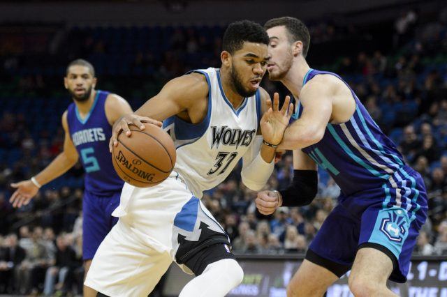 Karl-Anthony Towns drives to the basket.
