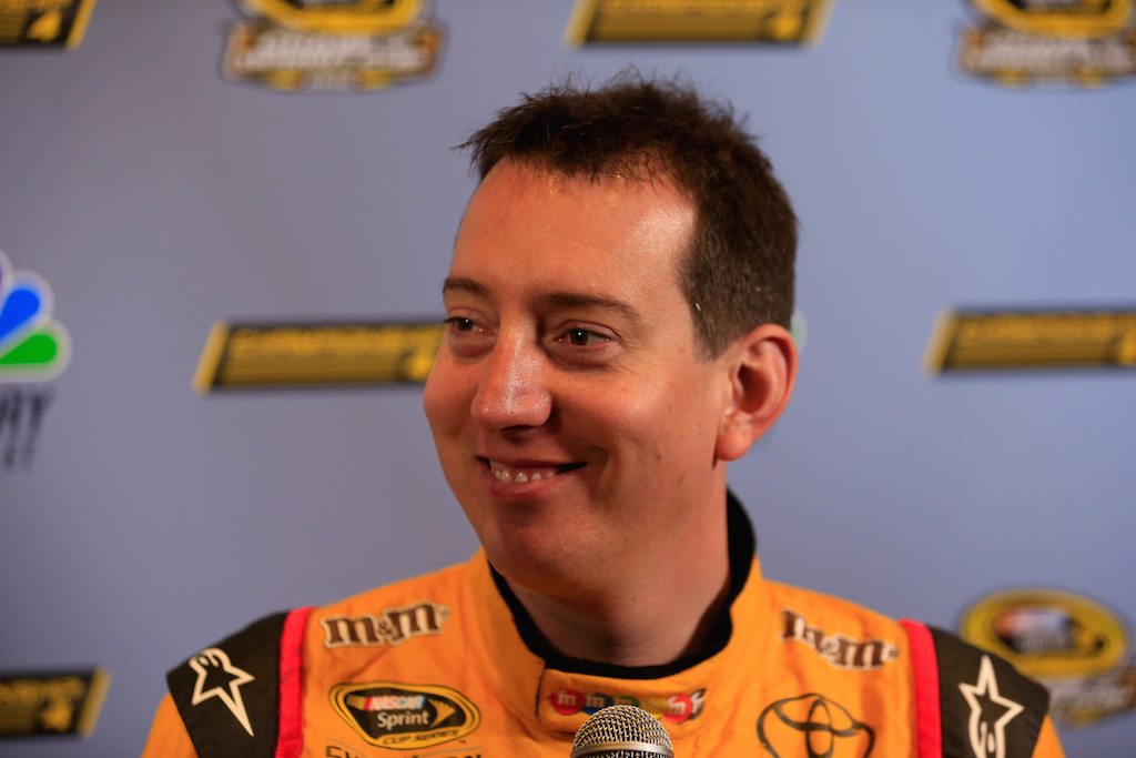 Kyle Busch talks to the media.