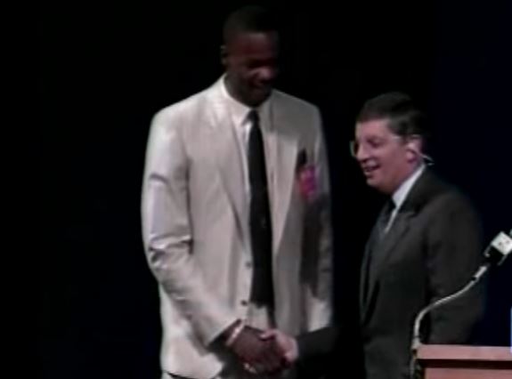Len Bias stands on stage during draft day with commissioner David Stern. 