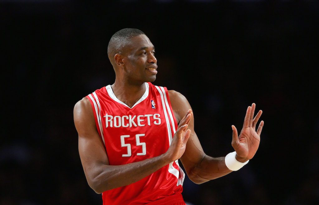 Dikembe Mutombo gestures during the game.