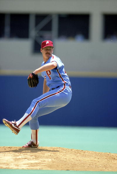 Kevin Gross of the Philadelphia Phillies winds back to pitch.