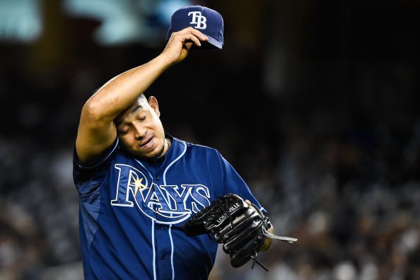 Joel Peralta of the Tampa Bay Rays wipes his forehead.