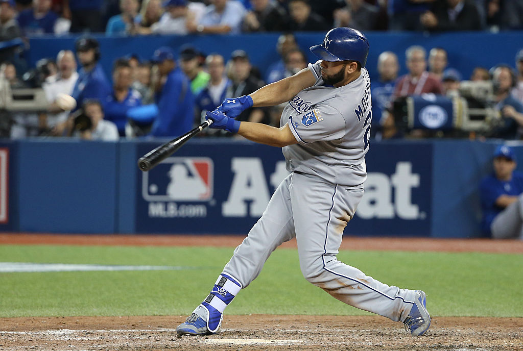 Kendrys Morales of the Kansas City Royals hits a two-run home run.