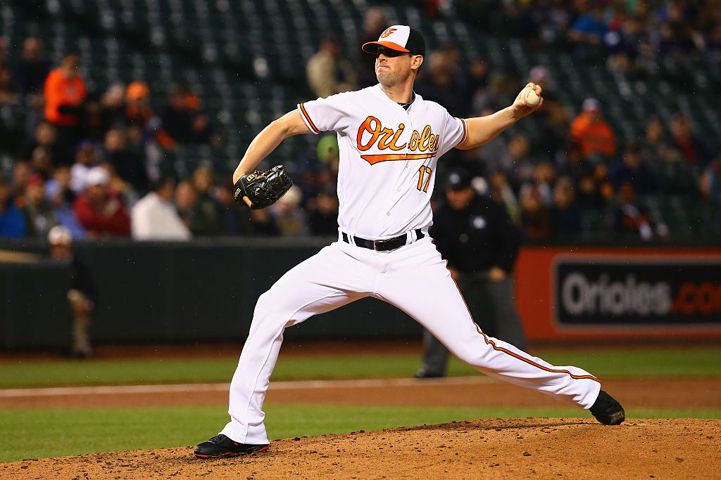Brian Matusz of the Baltimore Orioles pitches against the Seattle Mariners.