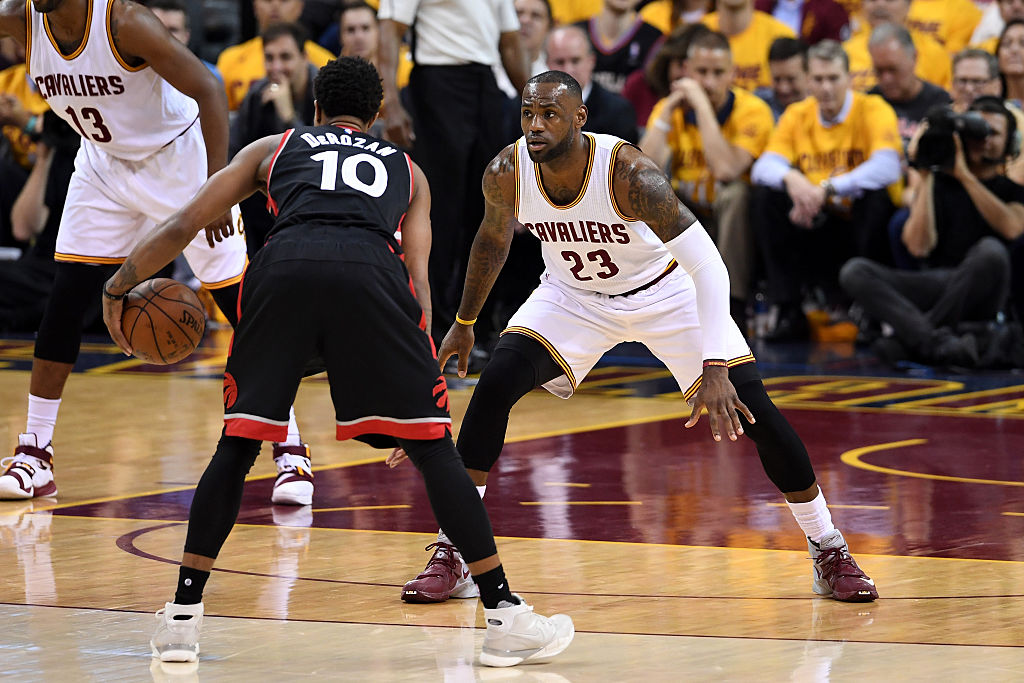 LeBron James defends DeMar DeRozan of the Toronto Raptors.