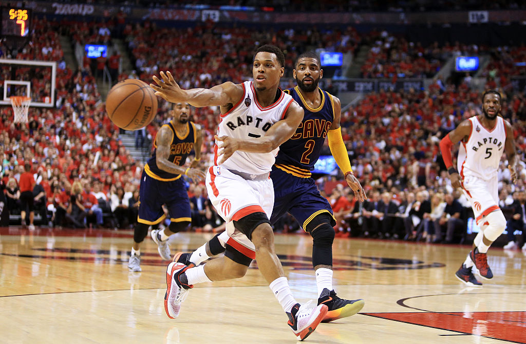 Kyle Lowry of the Toronto Raptors kicks to the corner for a three-pointer.