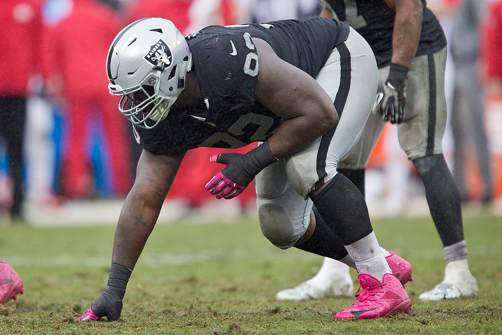Raiders defensive tackle Stacy McGee lines up