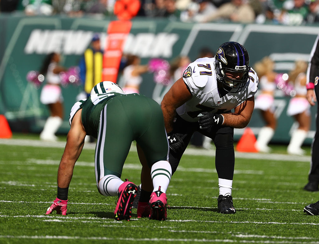 Ricky Wagner of the Baltimore Ravens is in action against the New York Jets