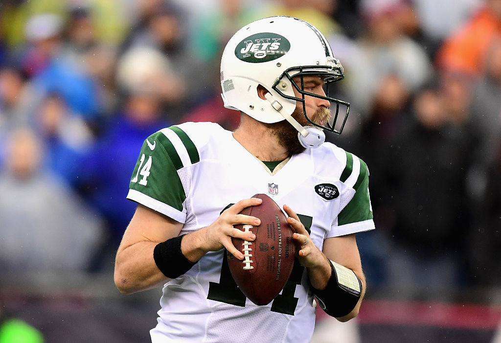 Ryan Fitzpatrick, formerly with the New York Jets, looks to throw the ball.