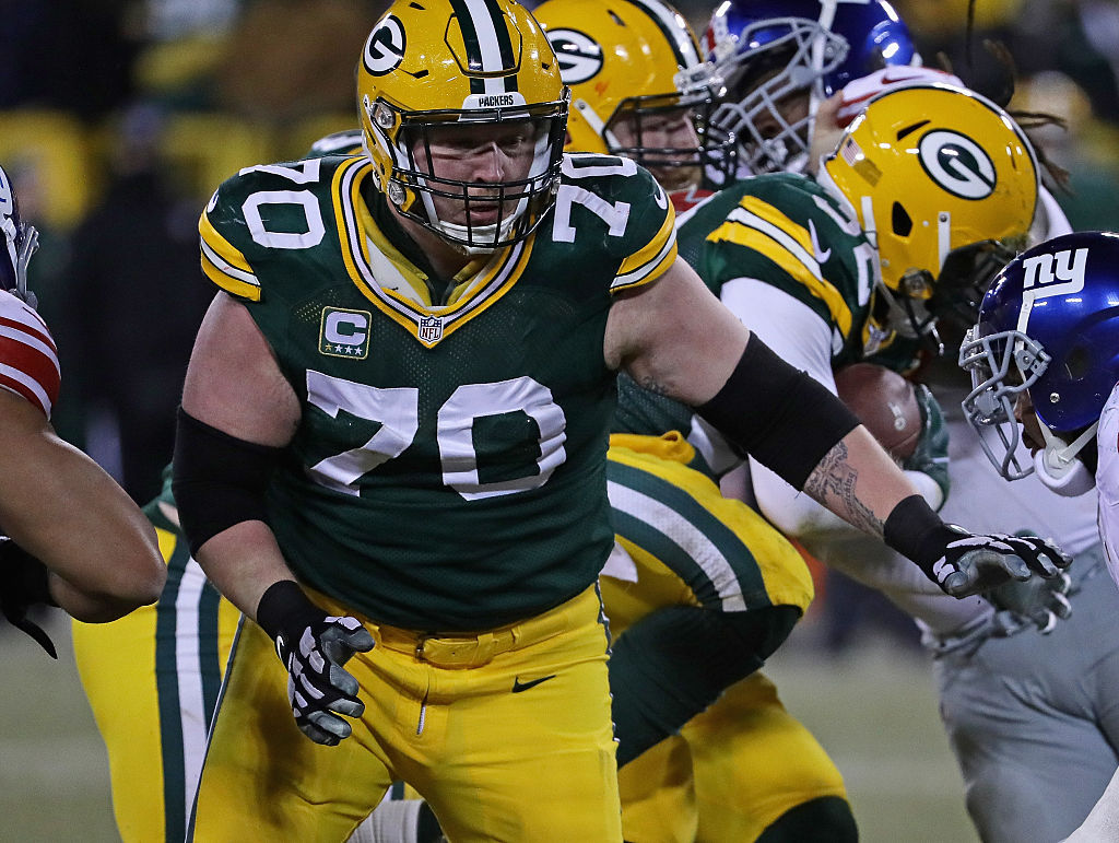 T.J. Lang of the Green Bay Packers moves to block against the New York Giants
