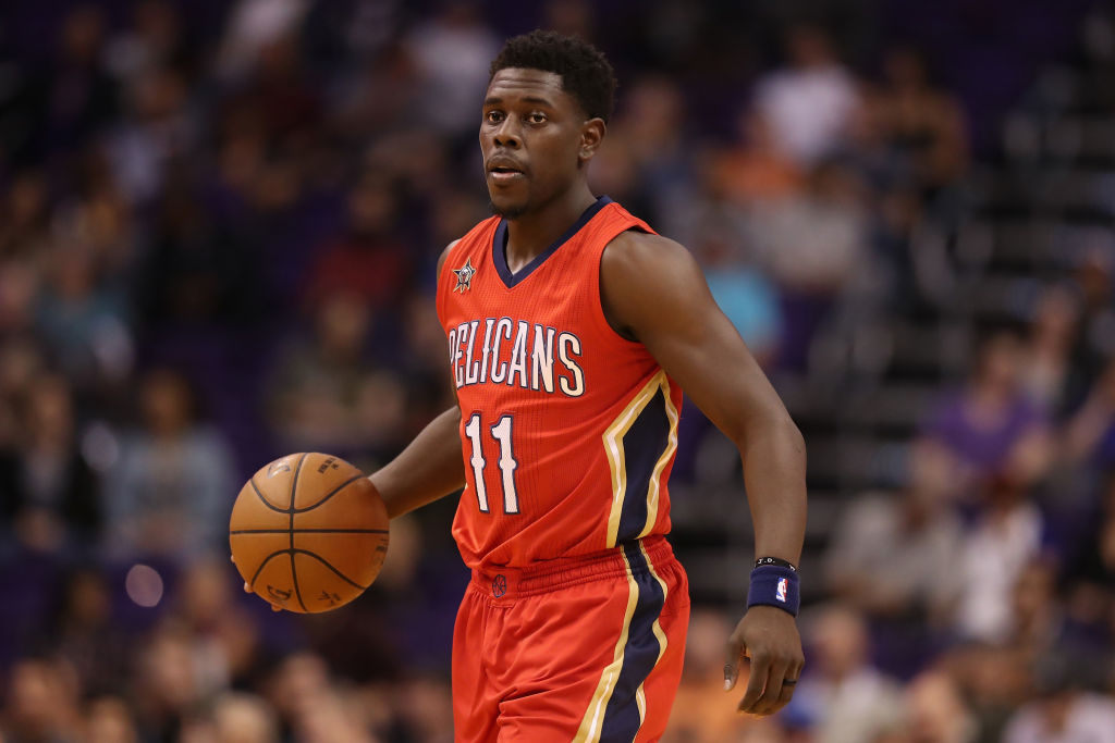Jrue Holiday dribbles up the floor.