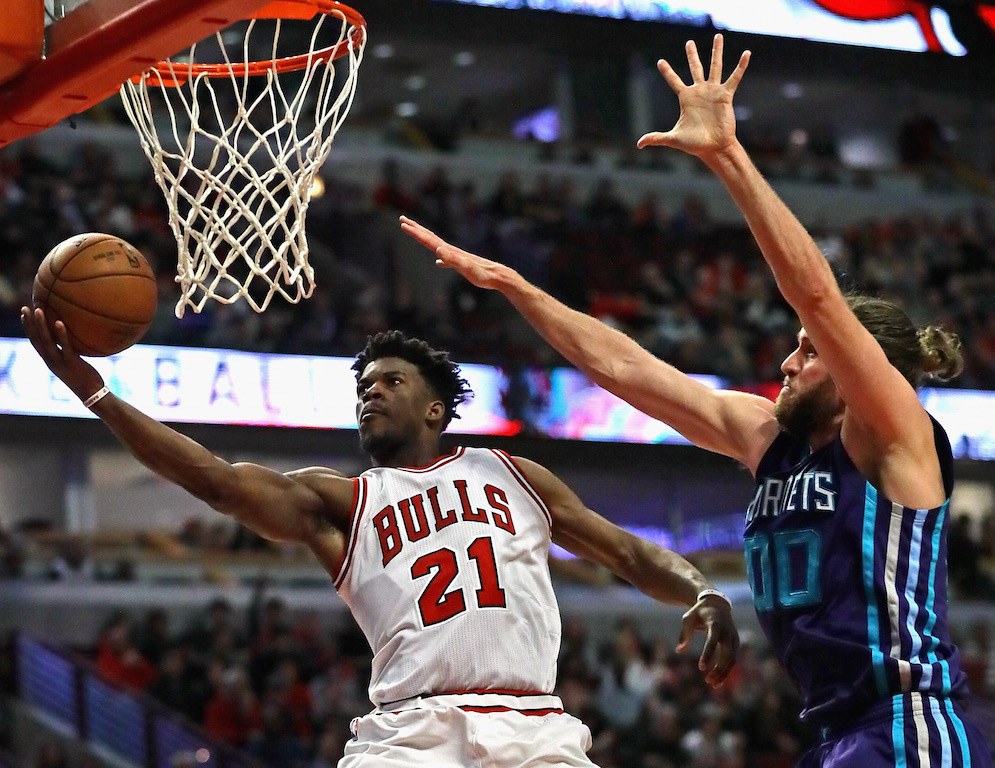 Jimmy Butler puts up a shot at the rim.