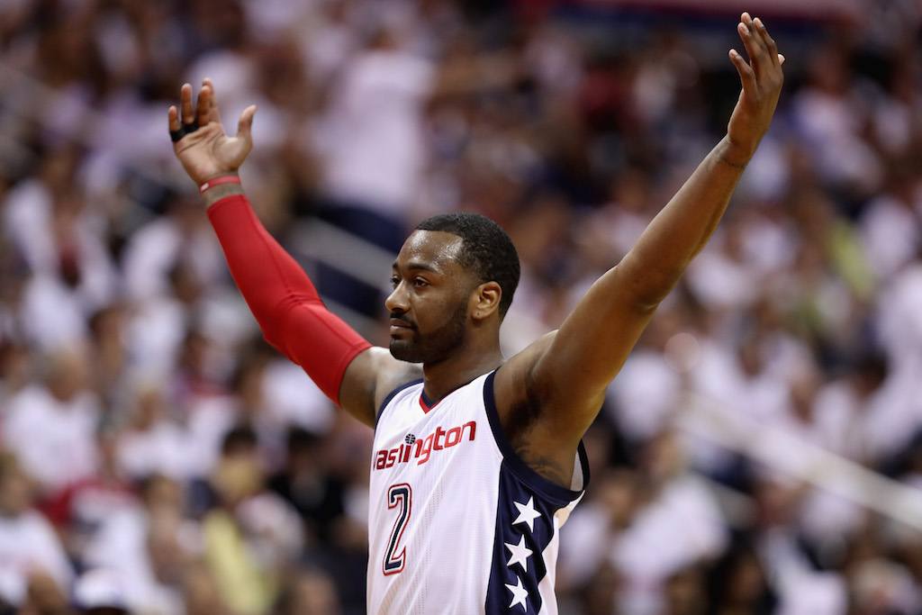 John Wall celebrates after scoring.