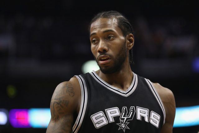 Kawhi Leonard looks on during the game.