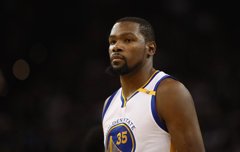 Kevin Durant looks on during the game. Kevin Durant looks on during the game.