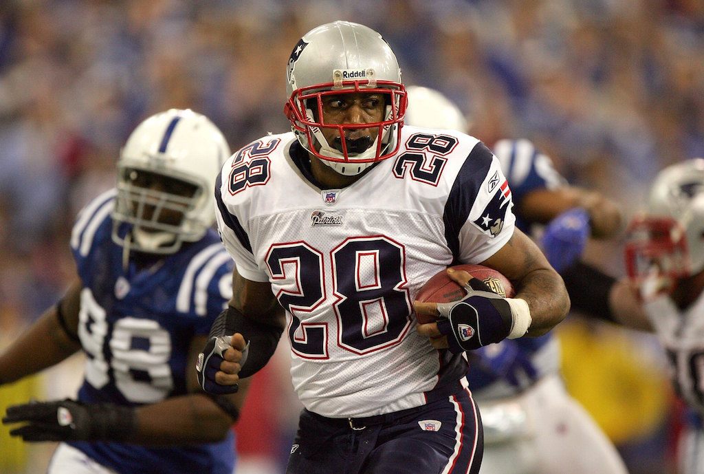 Corey Dillon runs against the Colts.