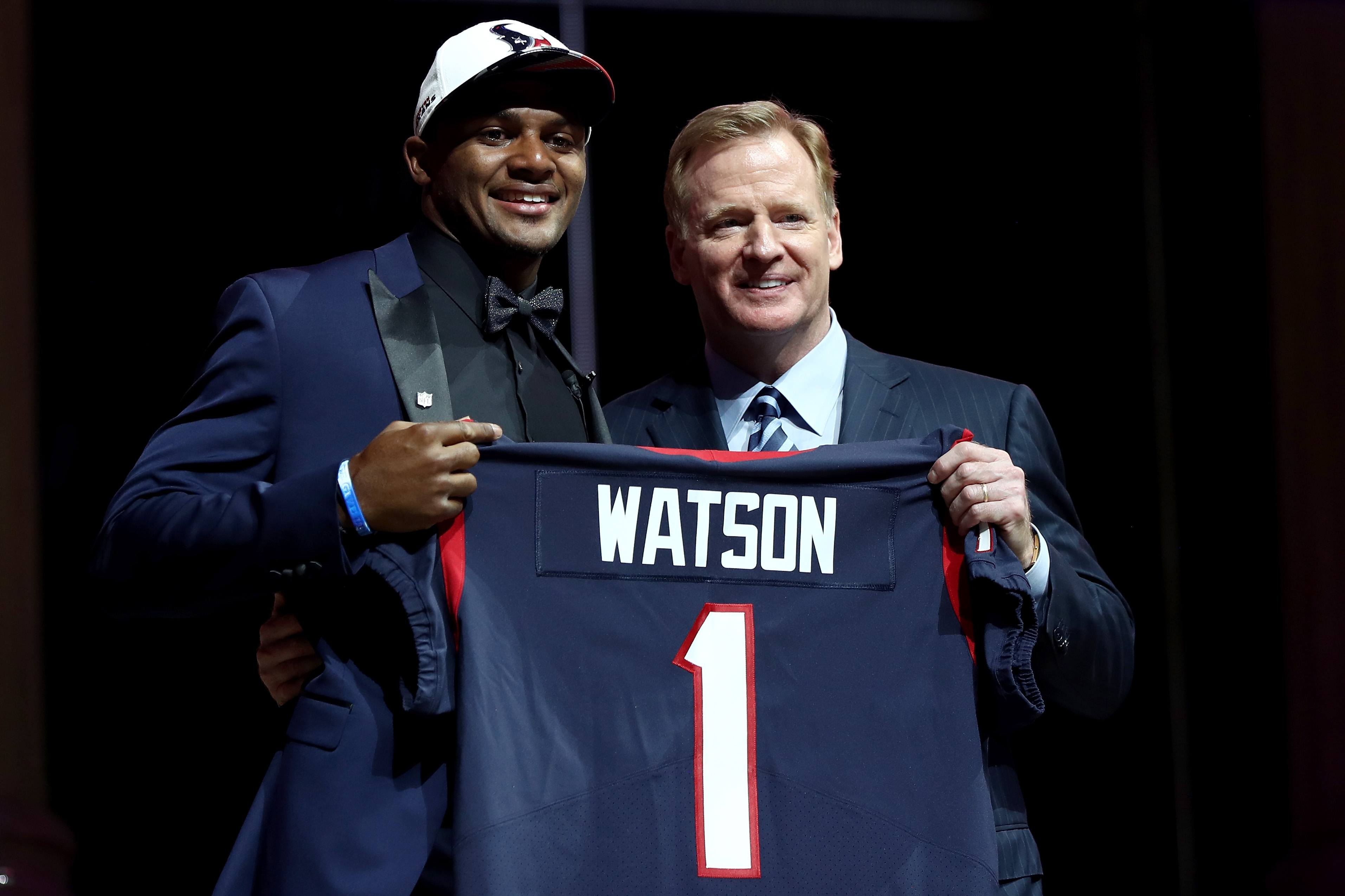 Deshaun Watson poses with NFL Commissioner Roger Goodell after being drafted by the Houston Texans.