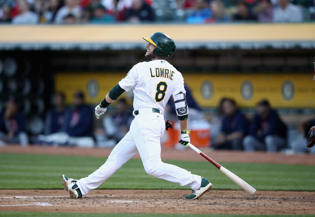 Jed Lowrie clubs a two-run homer. 