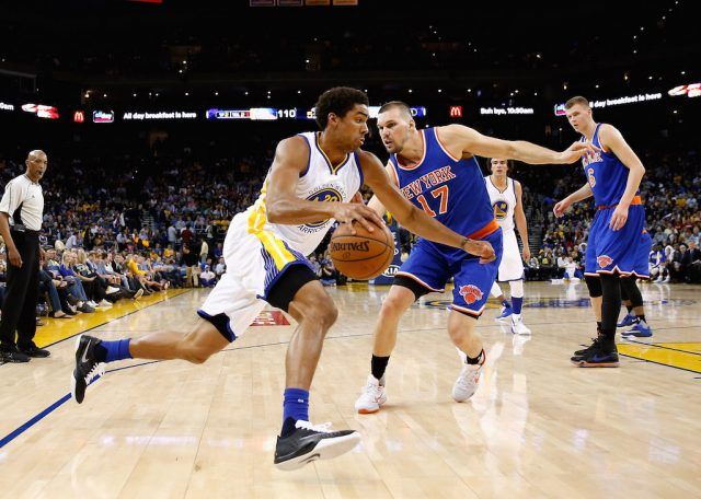 James McAdoo dribbles along the baseline.