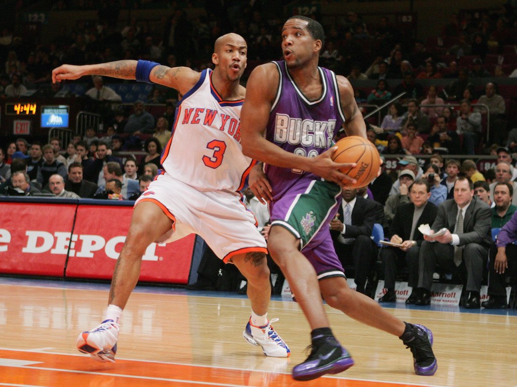 Michael Redd drives baseline.