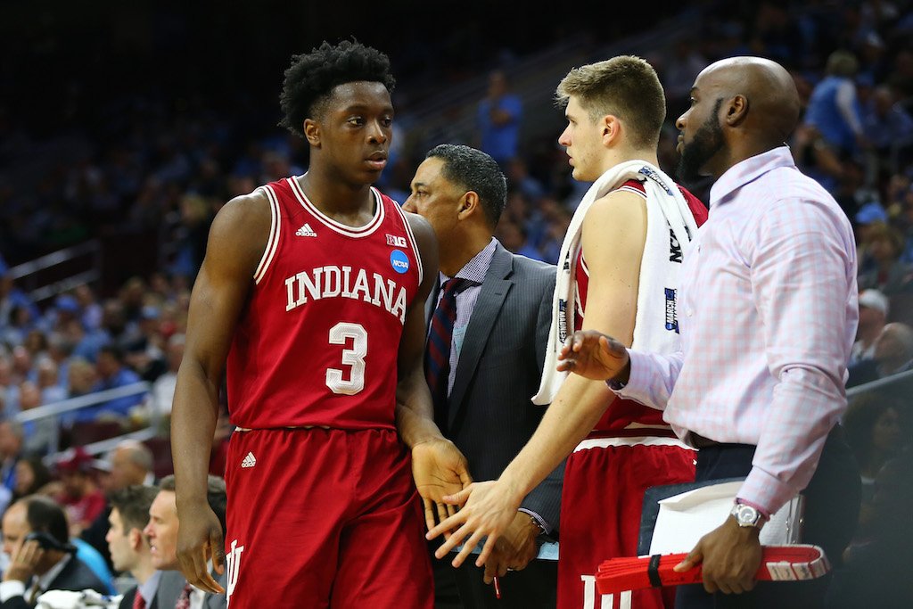 OG Anunoby high fives a teammate.