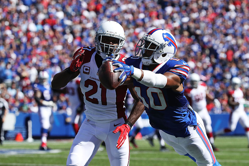Robert Woods, now with the Los Angeles Rams, makes a catch past Patrick Peterson of the Arizona Cardinals.