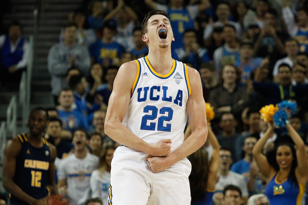 T.J. Leaf celebrates a dunk.