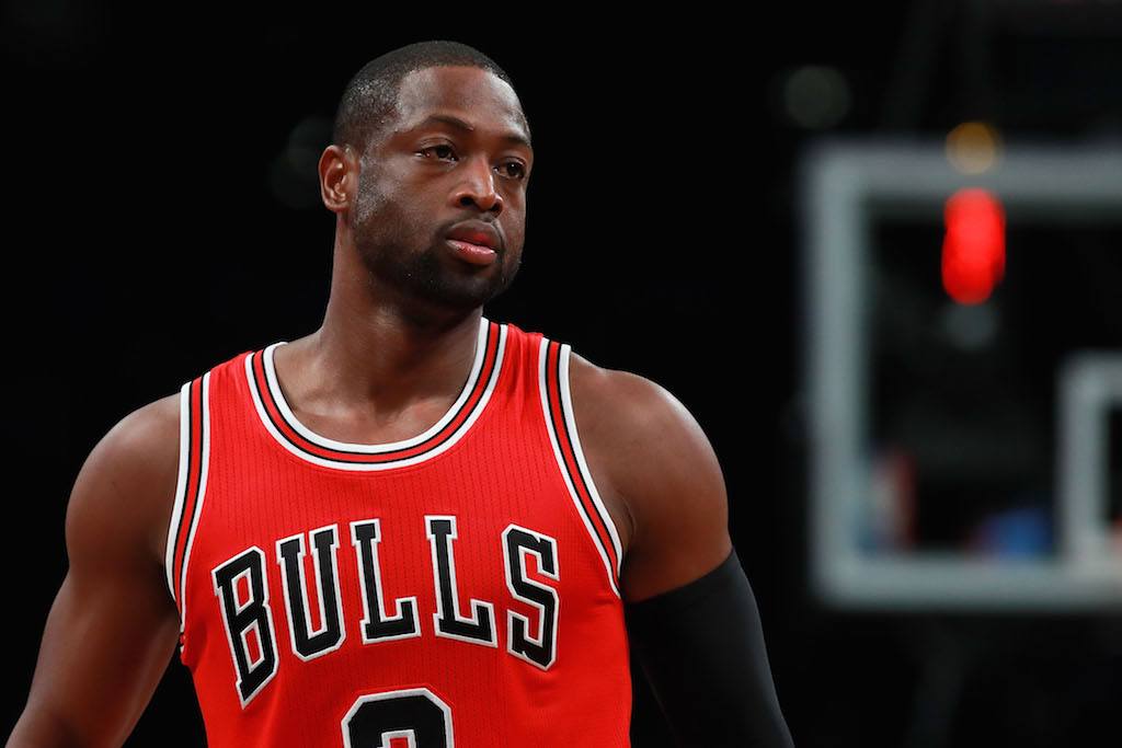 Dwyane Wade looks on during a game.