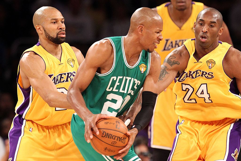 The Lakers surround the Celtics in an effort to get the ball.