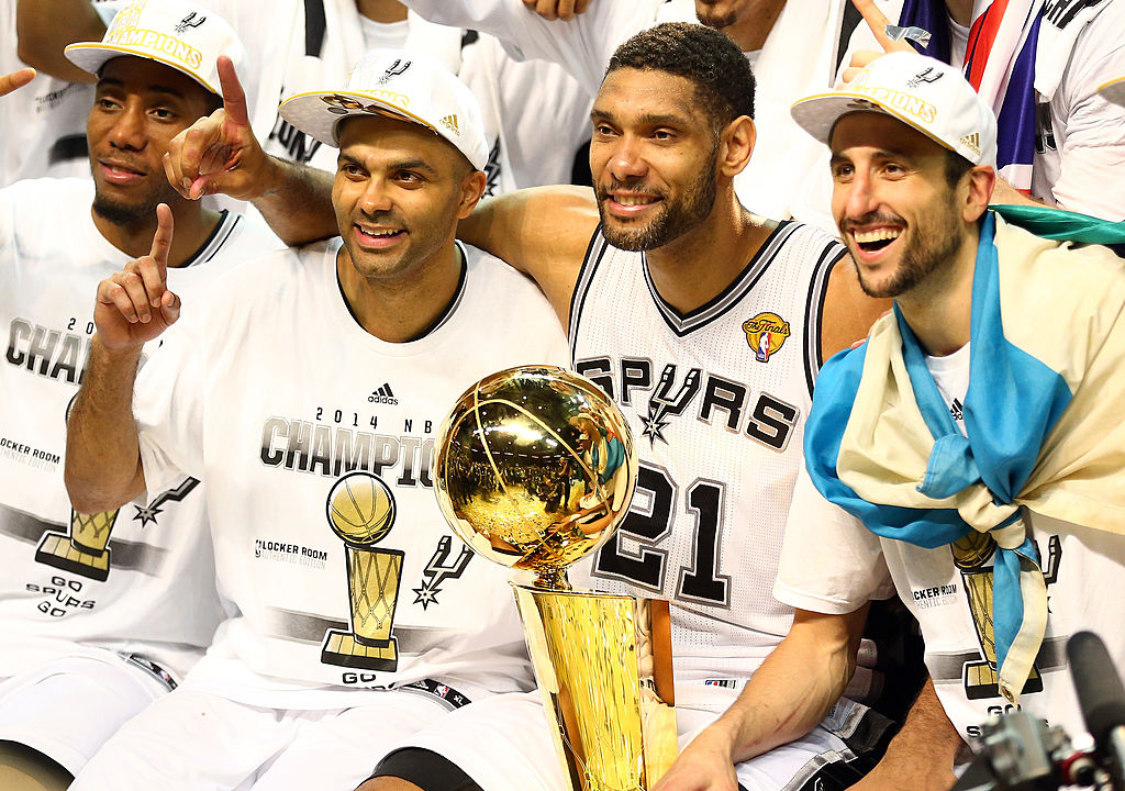 The Spurs pose for a picture after winning the 2014 NBA Finals.