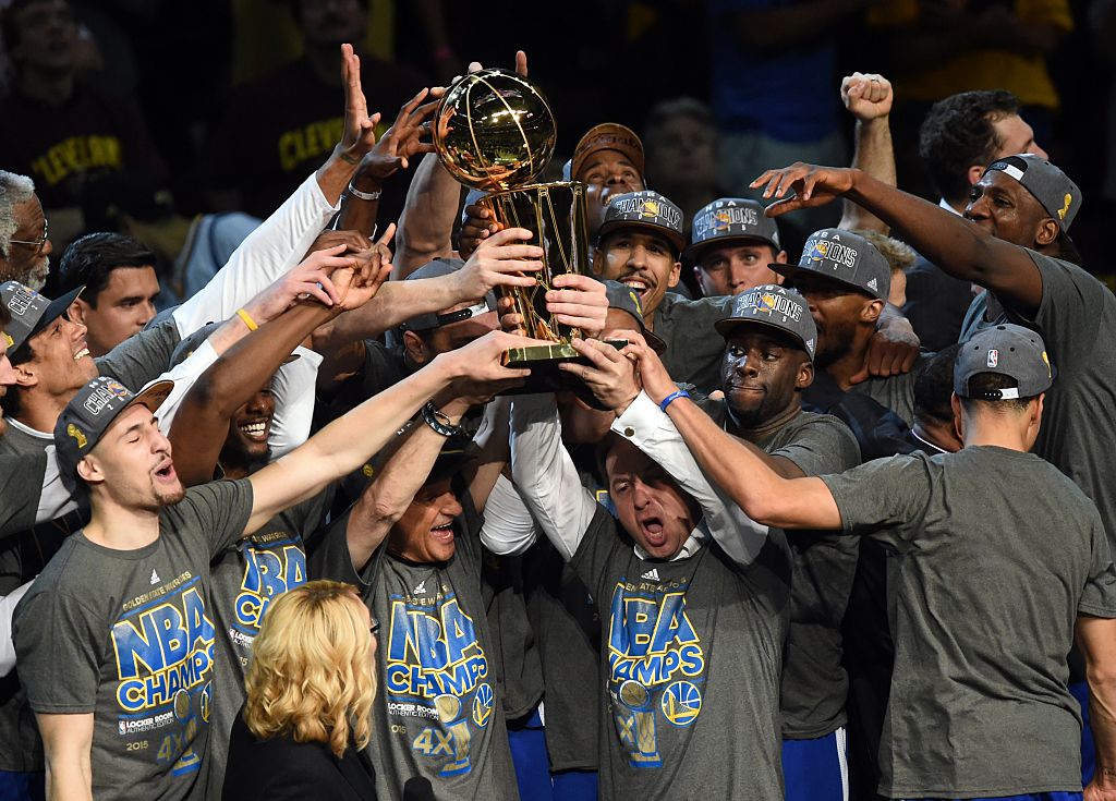 Golden State Warriors celebrate after defeating the Cleveland Cavaliers to win the 2015 NBA Finals. 