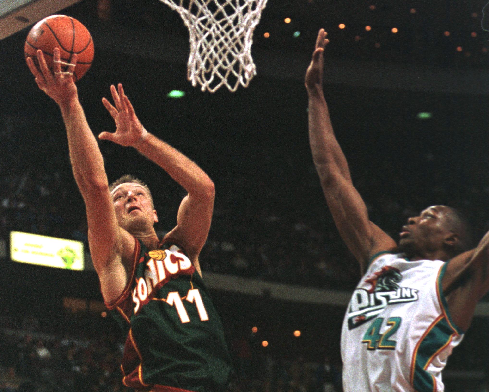 Theo Ratliff flies in for the block.