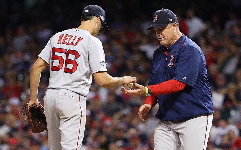 John Farrell takes the ball from Joe Kelly during Game 2 of the ALDS.