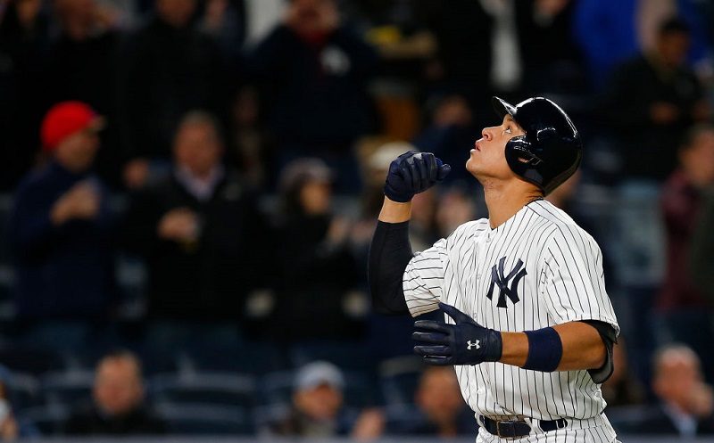 Aaron Judge of the New York Yankees gestures after he hit a home run against the Chicago White Sox at Yankee Stadium on April 19, 2017.