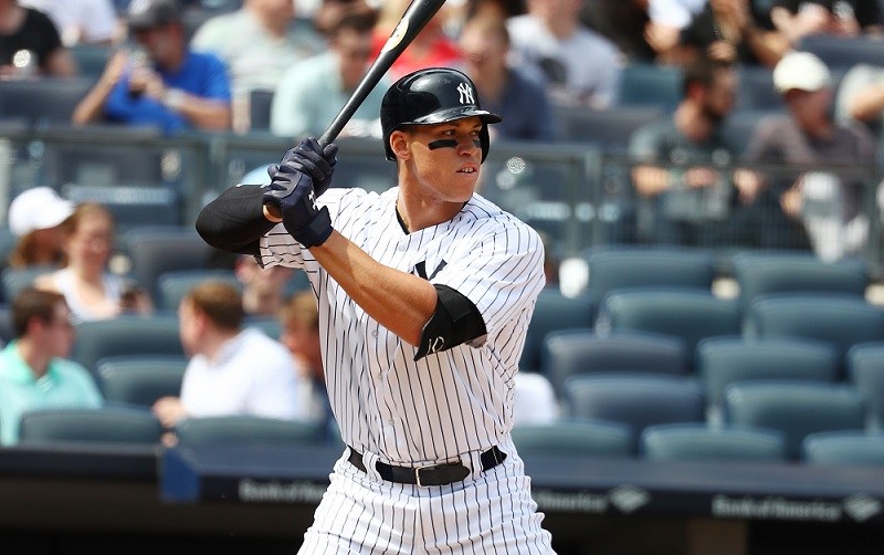 Aaron Judge hits in front of a largely empty section behind the visitor's dugout on April 29, 2017.