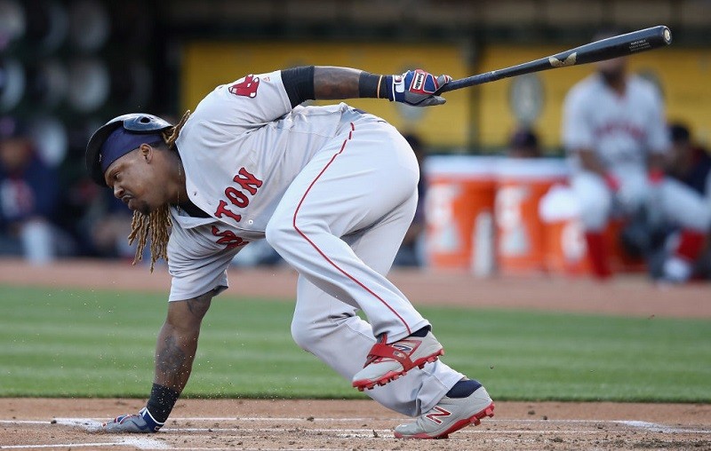Hanley Ramirez touches the ground as he slips.