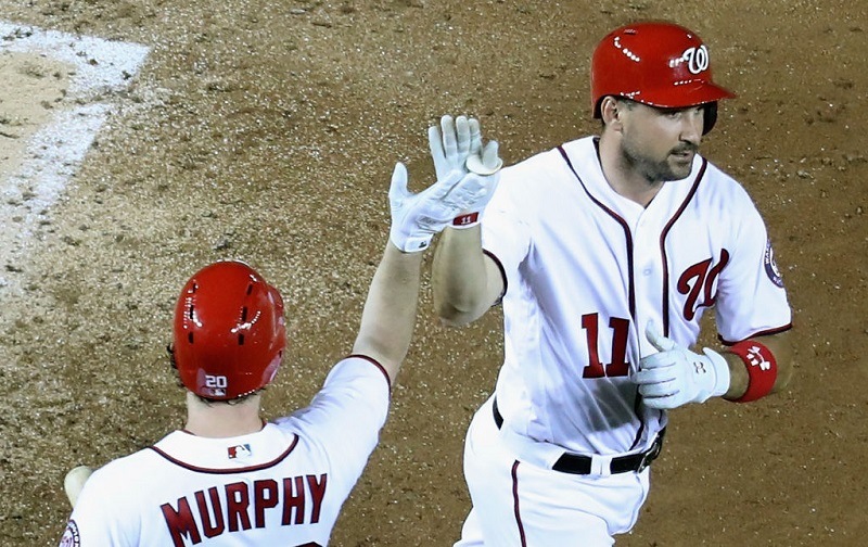 Ryan Zimmerman high-fives Daniel Murphy at Nationals Park.
