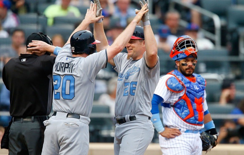 Adam Lind and Daniel Murphy celebrate against the New York Mets.