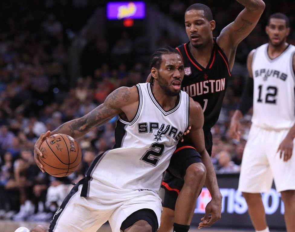 Kawhi Leonard drives to the basket.