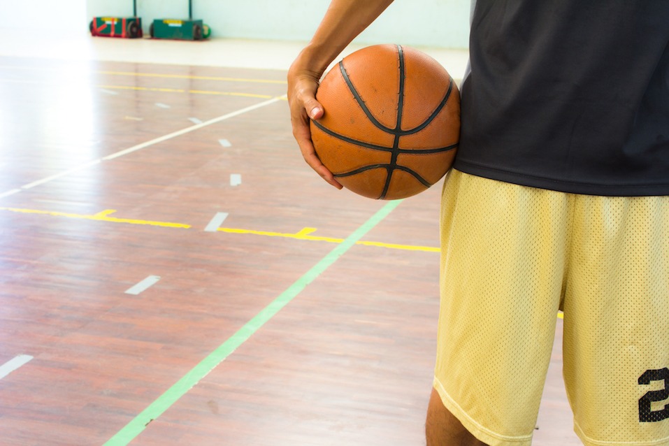 Player with basketball ball in gym. Player with basketball ball in gym.