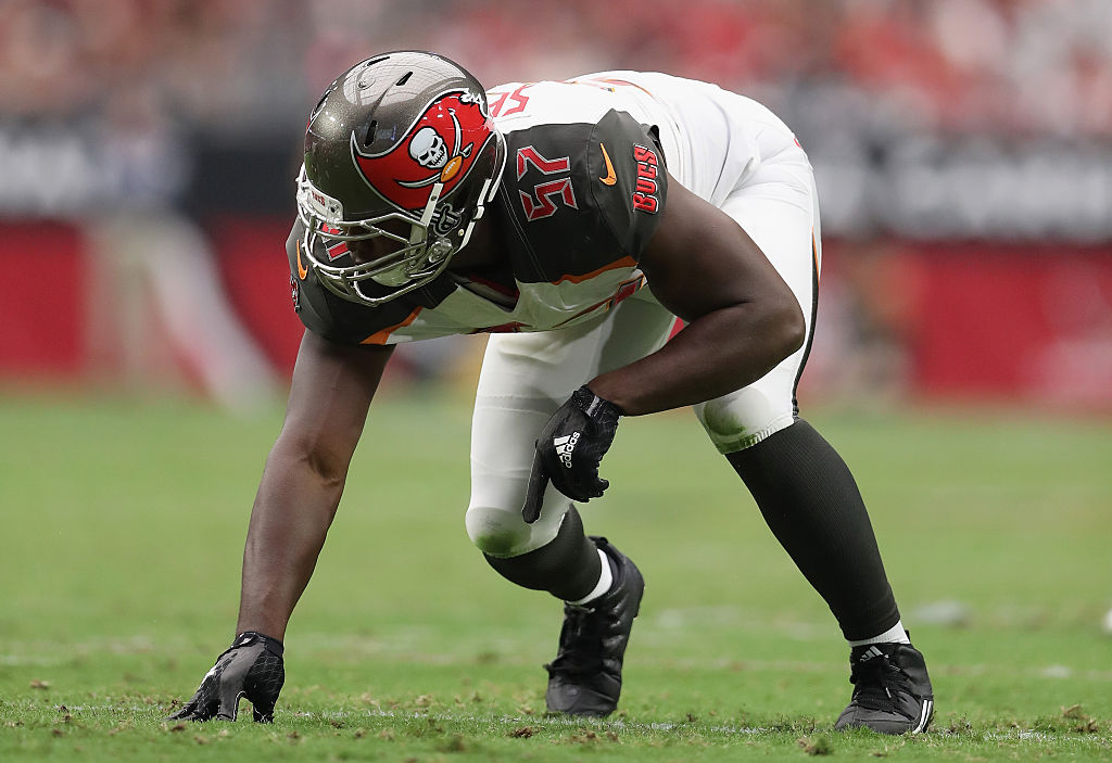 Defensive end Noah Spence of the Tampa Bay Buccaneers prepares to take off.
