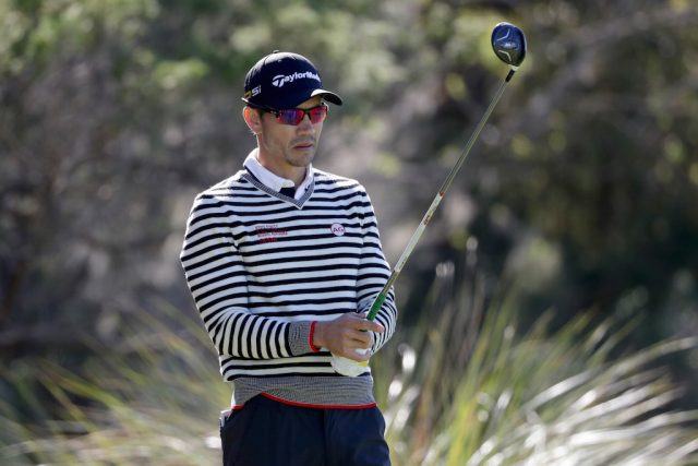 Camilo Villegas gets ready to shoot. Camilo Villegas prepares to tee off.