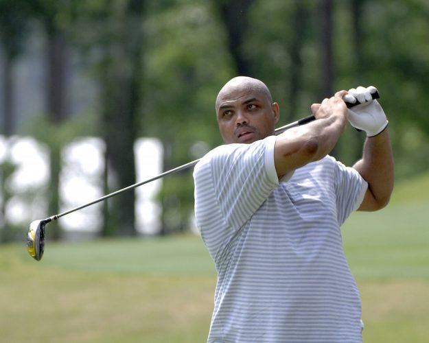 Charles Barkley drives the ball.