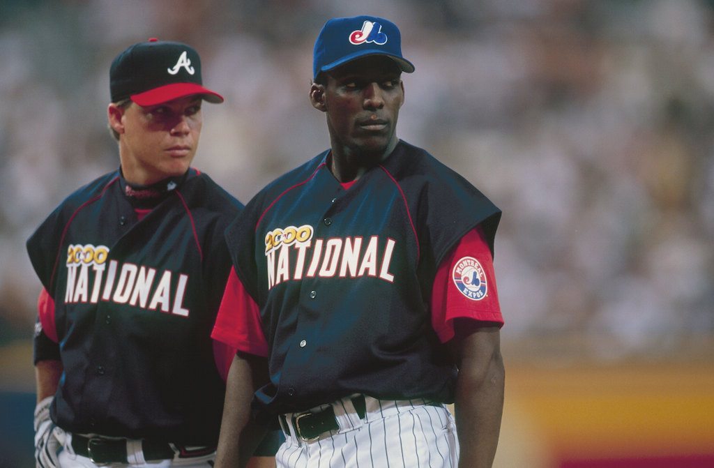 Vladimir Guerrero (R) and Chipper Jones look on during the 2000 MLB All-Star Game.