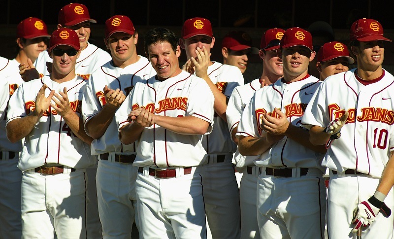 Ian Kennedy and the USC Baseball team clap before a game in 2005.