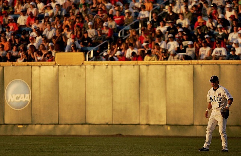 Jordan Dodson #7 of the Rice Owls patrols right field.