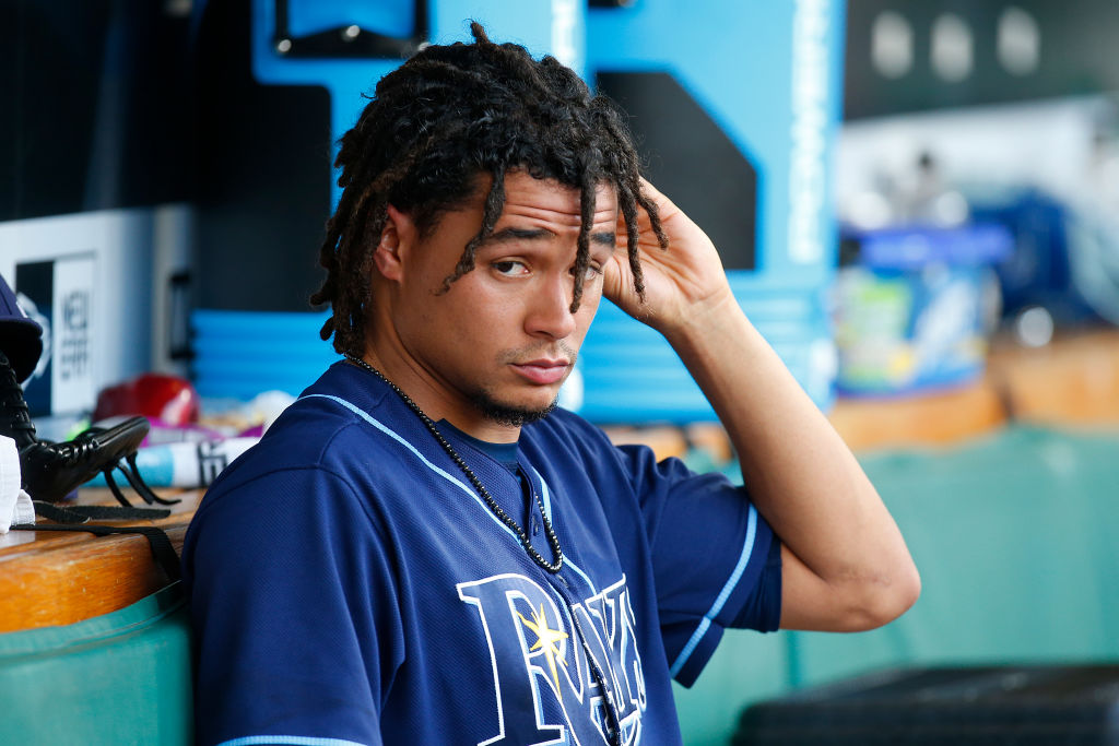 Chris Archer rests in the dugout.