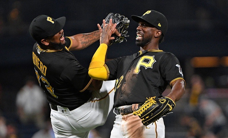 Felipe Rivero #73 of the Pittsburgh Pirates celebrates with Andrew McCutchen #22 after the final out in the Pittsburgh Pirates' 4-2 win over the Milwaukee Brewers on July 17.