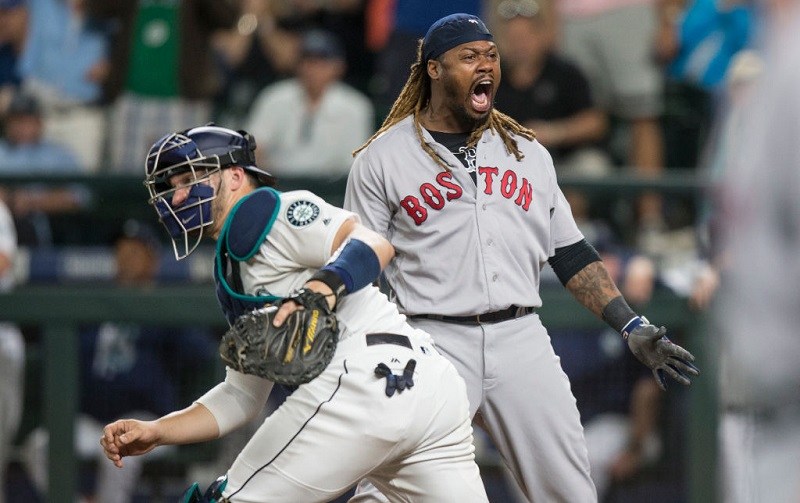 Hanley Ramirez #13 of the Boston Red Sox celebrates scoring a run on a single by Sandy Leon.