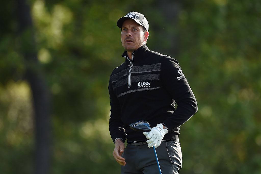 Henrik Stenson looks on after the shot. Henrik Stenson watches his shot.